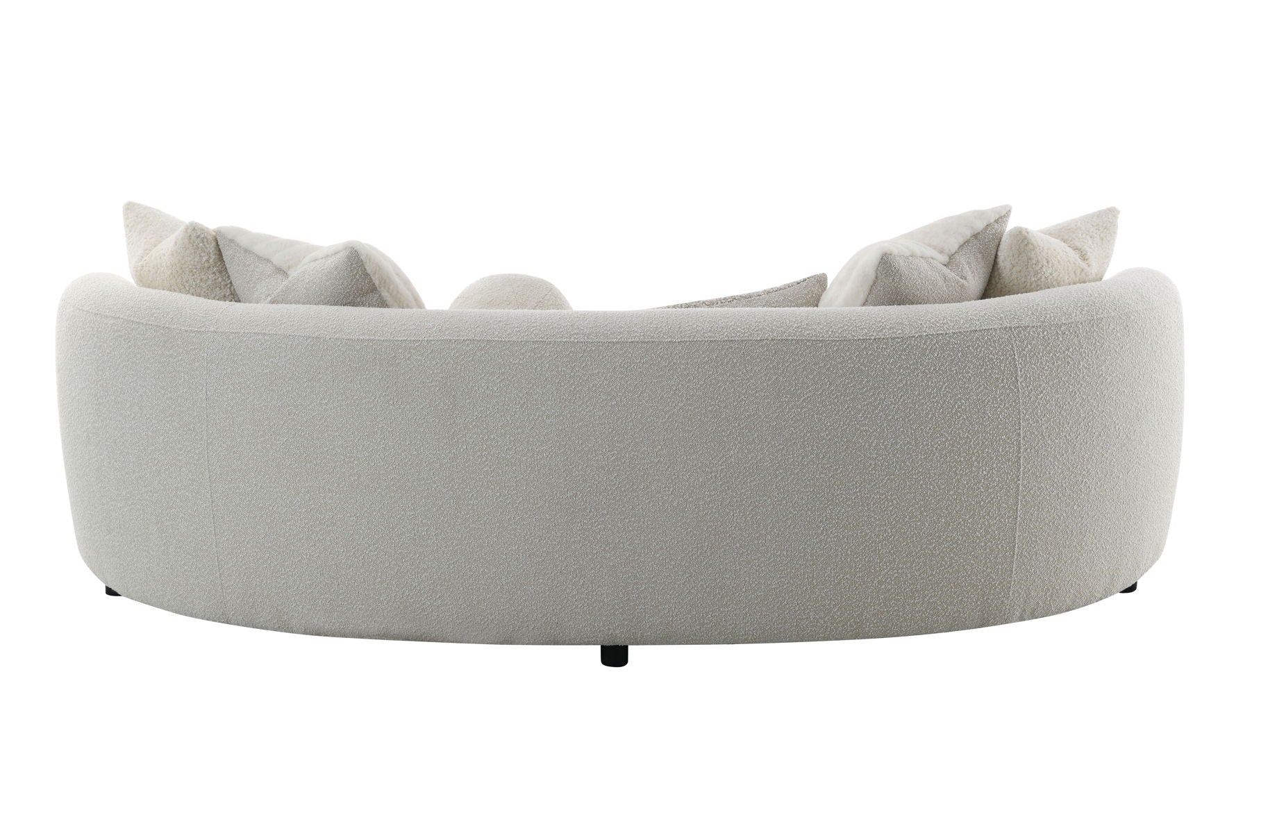 The Couch.com Iniko Boucle Sofa features a light beige fabric finish and durable design, shown from the back with several matching toss pillows, all set against a white background.