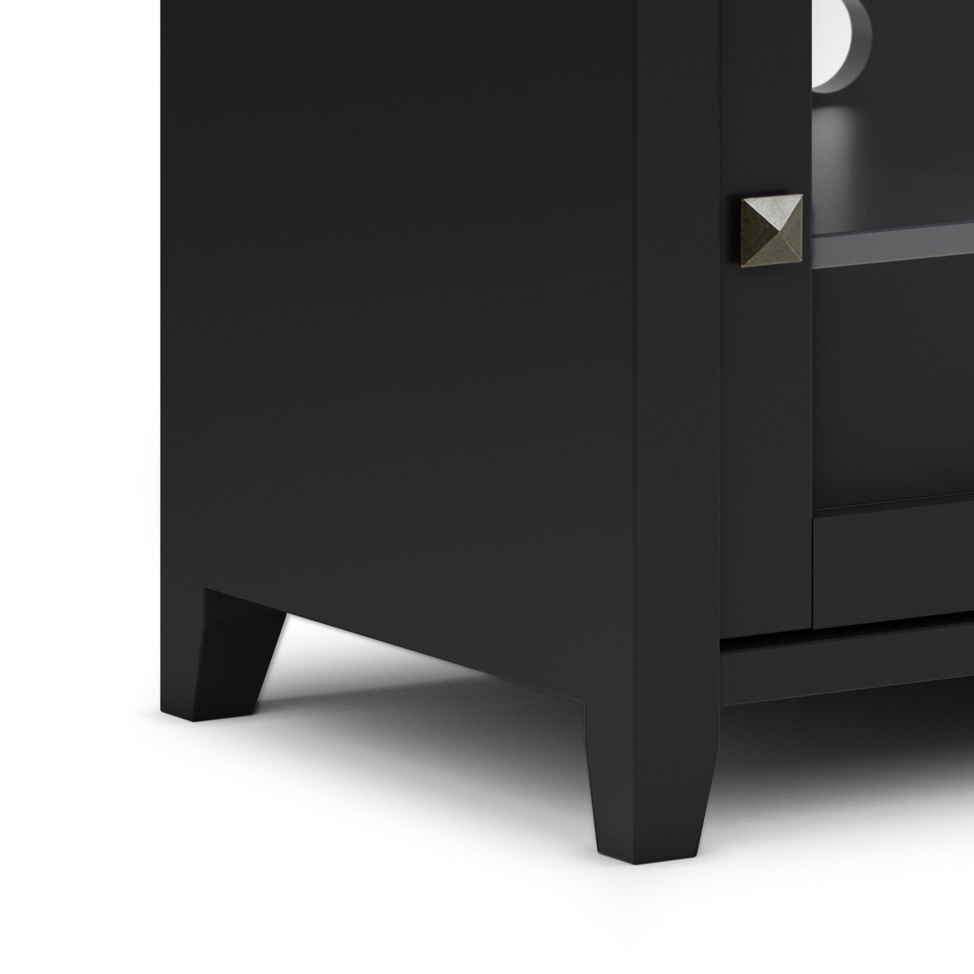 Close-up of the bottom corner of the Cosmopolitan - Handcrafted TV Media Stand, featuring a black finish, square metal knob, and short tapered legs on a white background.