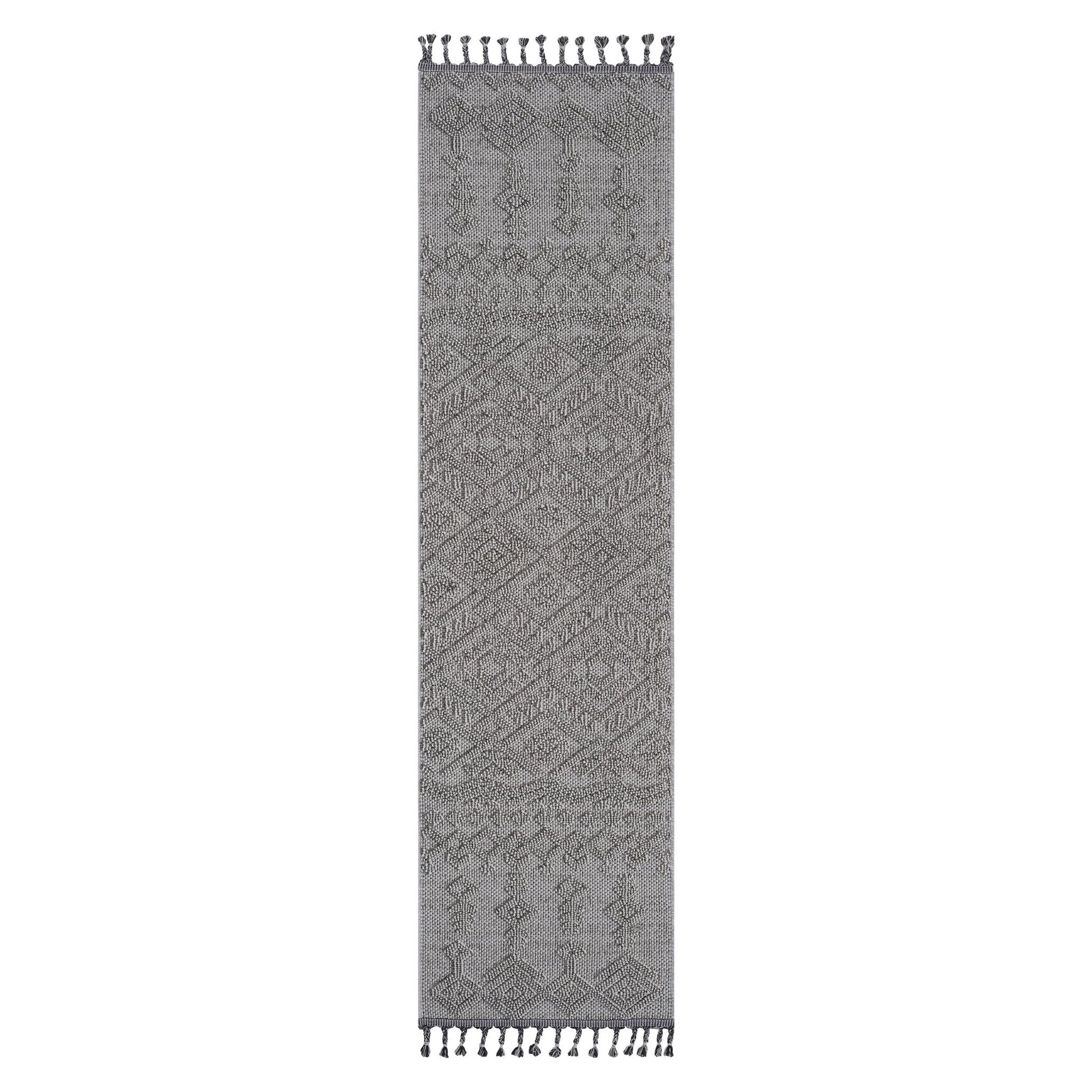 The Guros - Traditional Indoor/Outdoor Area Rug is a long, narrow gray runner with intricate geometric patterns and tassels at both ends.