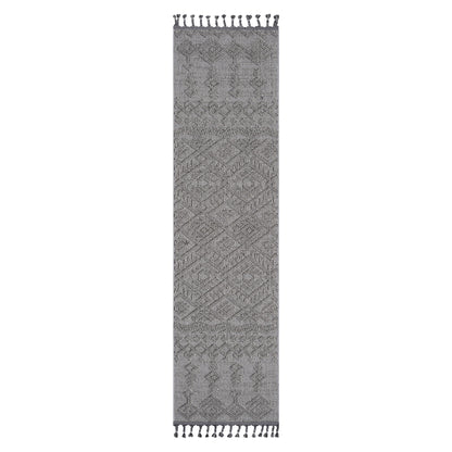 The Guros - Traditional Indoor/Outdoor Area Rug is a long, narrow gray runner with intricate geometric patterns and tassels at both ends.
