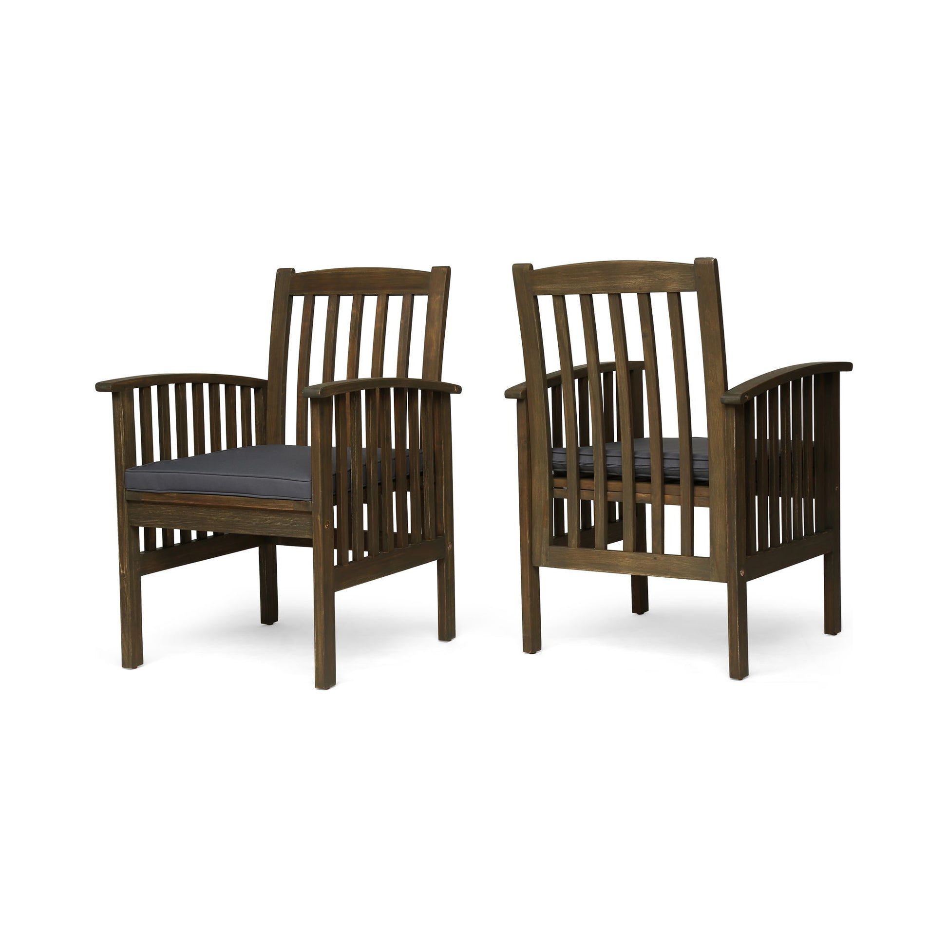 Two Casa - Acacia Dining Chairs with cushions, featuring dark brown frames and vertical slat backs and sides, are arranged so one faces forward while the other displays its back.