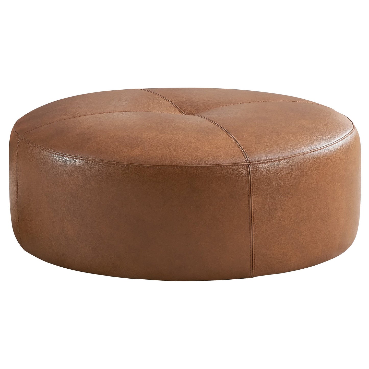 The Rochelin - Ottoman - Tan features a round, tan leather design with visible stitching and a smooth, cushioned surface, shown against a plain white background.