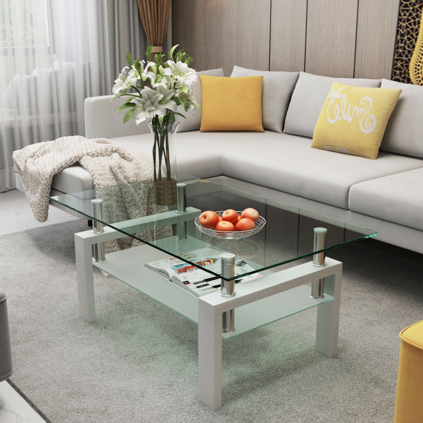 A modern living room features a white sectional sofa with yellow pillows, and a Rectangle Coffee Table, Modern Side Center Tables For Furniture, holding white flowers and oranges above magazines on a gray rug.