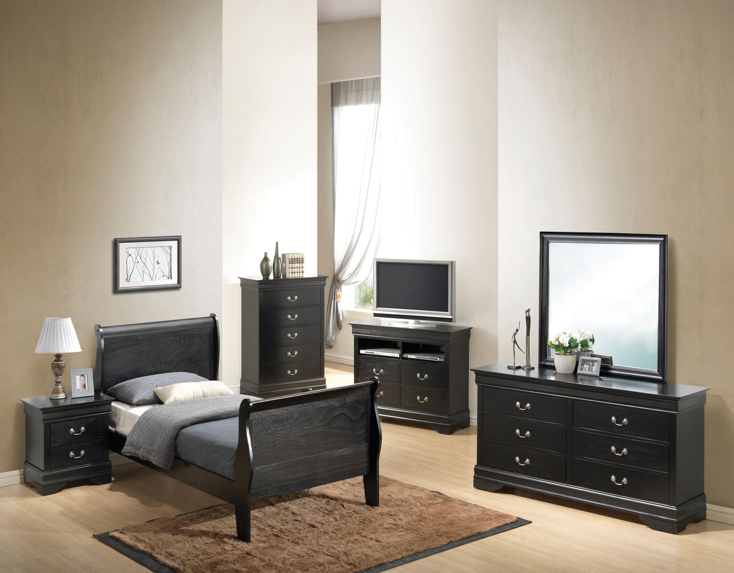 Modern bedroom featuring a Panel Sleigh Bed, two dressers, a nightstand, TV stand, and large mirror. The space has light walls, wood flooring, a brown rug, and natural light streaming in from the window.