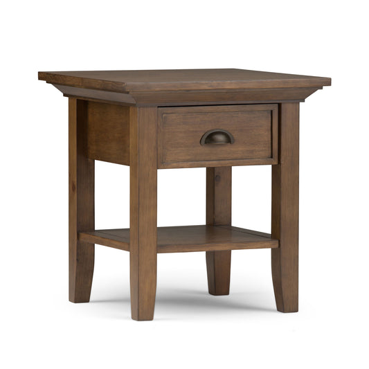 The Redmond Handcrafted End Table features a square top, single drawer with metal pull, lower shelf, and four straight legs, all finished in a warm medium brown.