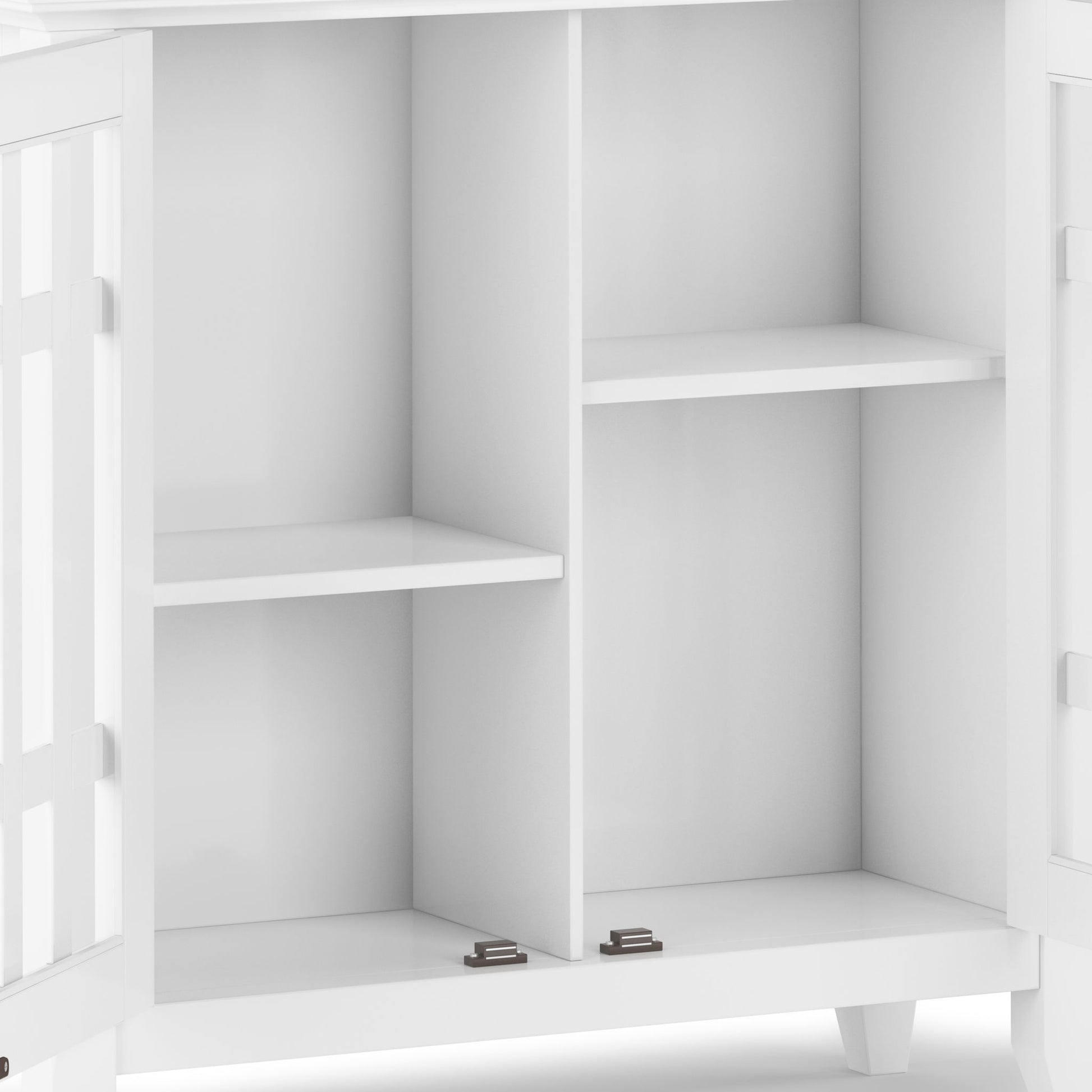 A close-up of the Bedford - Storage Media Cabinet with open doors, revealing two vertical compartments split by horizontal shelves for four storage sections. Features clean lines and metal hinges at the bottom.