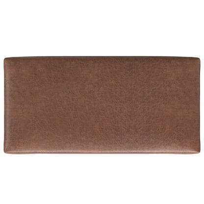 The Rebecca Ottoman is a rectangular brown leather storage coffee table with a lift-up lid, seen from above, featuring a smooth top and subtle textured pattern.