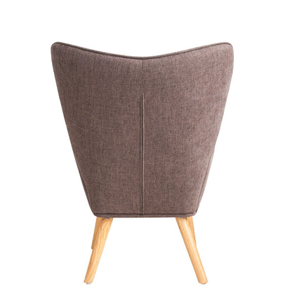 The Accent Chair With Ottoman features a creative splicing cloth surface in colorful hues and is shown from the back, highlighting its modern design against a white background.