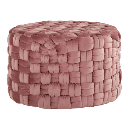 The Braided - Versatile Round Ottoman features a chunky, woven texture in dusty rose pink fabric for a soft and cozy look.