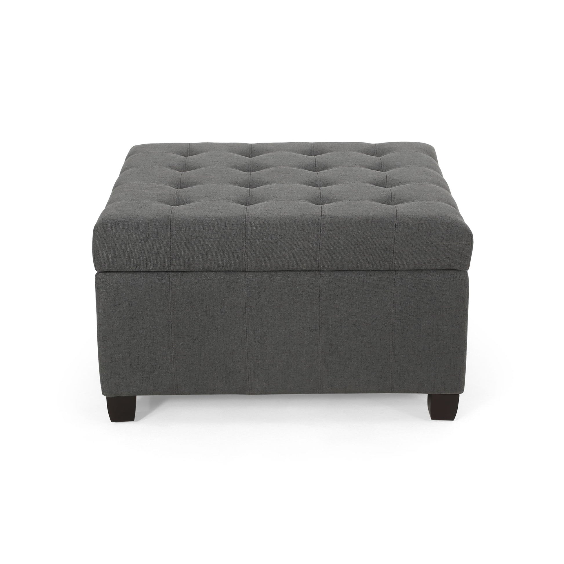 The Isabella Contemporary Ottoman With Storage features a square dark gray upholstered design, tufted button top, and short black legs, shown from the front against a white background.