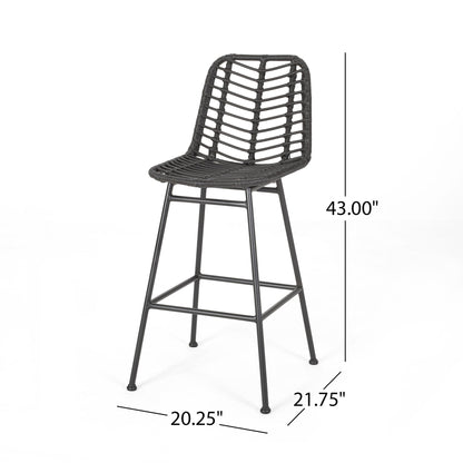 The Sawtelle Outdoor Wicker Barstools (Set of 2) feature black woven seats and backs with an open geometric pattern, high backrests, and metal legs. Each stool measures 43"H x 21.75"W x 20.25"D.