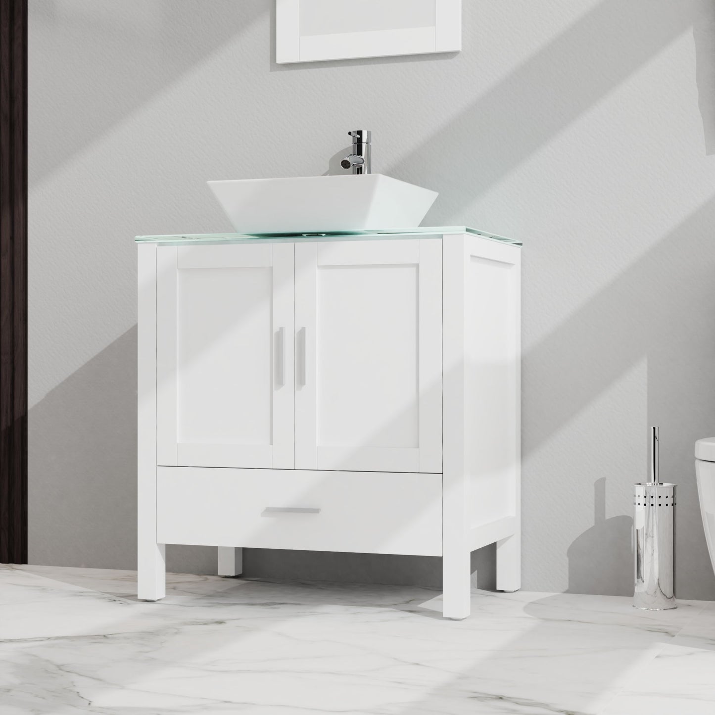 Bathroom Vanity And Sink Combo Glass Top Cabinet With Mirror features two cabinet doors, one drawer, a vessel sink with faucet, and stands on four legs on a marble floor. A partial view of a toilet appears to the right.