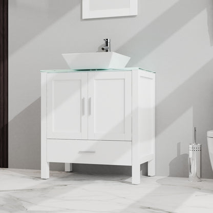 Bathroom Vanity And Sink Combo Glass Top Cabinet With Mirror features two cabinet doors, one drawer, a vessel sink with faucet, and stands on four legs on a marble floor. A partial view of a toilet appears to the right.