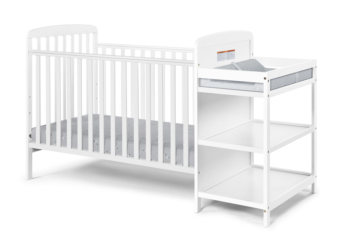 The Ramsey 3-in-1 Convertible Crib/Changer Combo features a white wooden crib with vertical slats, attached to a matching changing table with two open shelves and a padded mat on top.