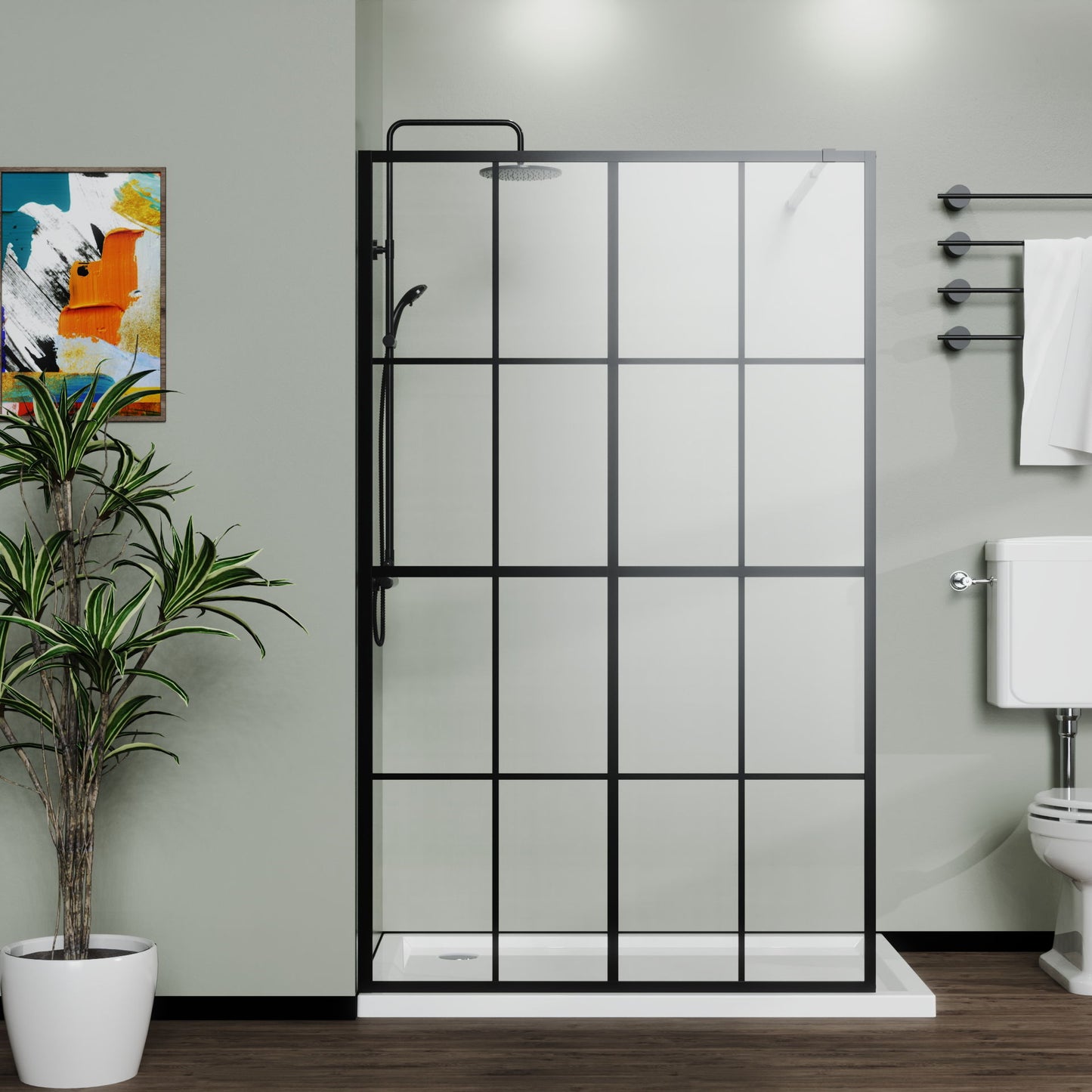 A modern bathroom with the Shower Screen Walk In Wet Room - Black featuring a black grid frame, wall-mounted showerhead, white toilet, towel on a rail, potted plant, and abstract art on a green wall.