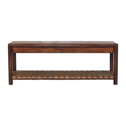The Regency - Woven Bench - Brown features a smooth rectangular wooden top, sturdy legs, and a woven lower shelf for storage, all in a rich brown finish.