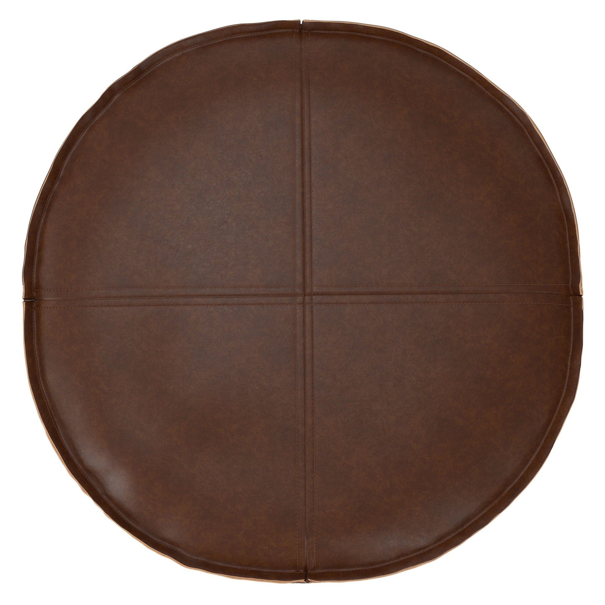 The Brody - Round Pouf is a brown leather cushion with visible stitching that divides the smooth, slightly shiny surface into four equal sections.