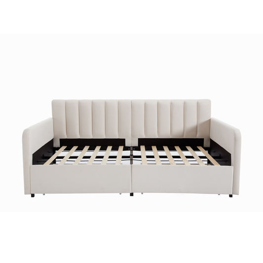The Flora Upholstered Daybed features a lavish modern design with a ribbed tufted backrest and includes 2 drawers, shown with its seat pulled out to reveal a wooden slatted pull-out bed base.