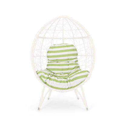 The Cosmos - Round Hammered Iron Teardrop Chair features a white, egg-shaped woven frame with green and white striped cushioned seat and backrest, supported by four white legs.