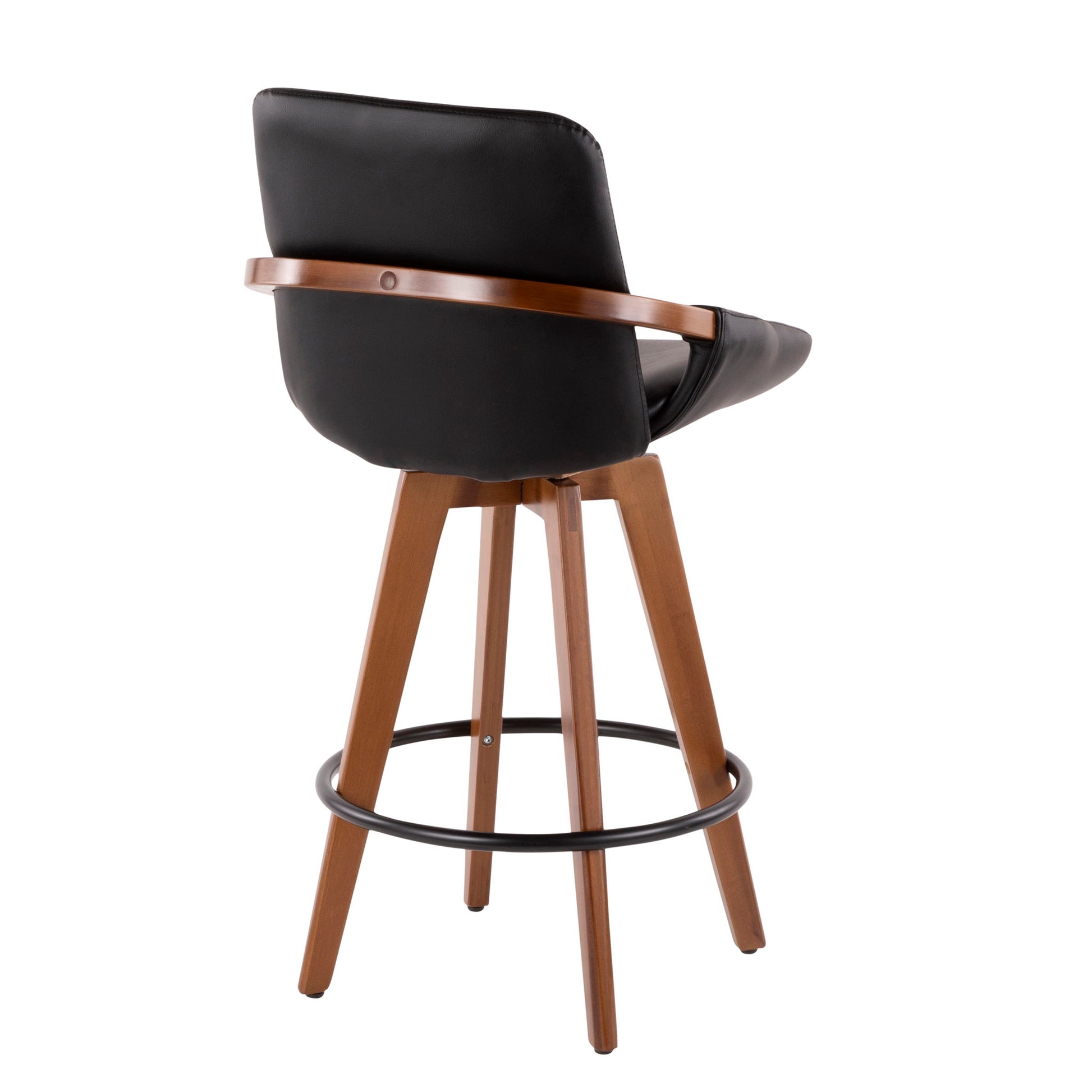 The Cosmo - Mid Century Counter Stool features black leather upholstery, a curved backrest with a dark wood accent, wooden legs, and a circular footrest. Shown from the rear at an angle.