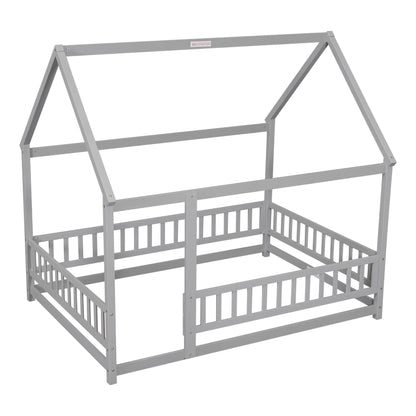 The Floor Wooden Bed With House Roof Frame and Fence Guardrails is a gray wooden bed designed like a small house, featuring a peaked roof and open sides with vertical slats.