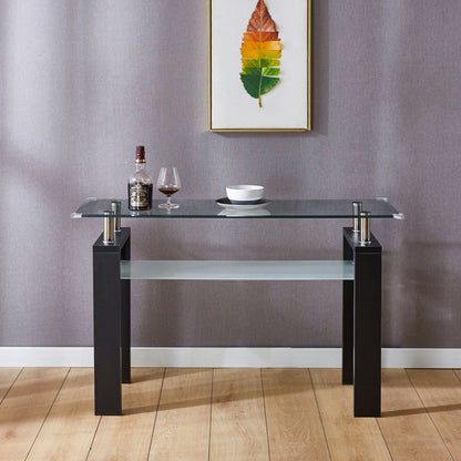 The Clear Glass Top Side Table, Modern Design For Home, with black legs, displays a wine bottle, glass, and white bowl against a gray wall. A framed leaf artwork hangs above it.