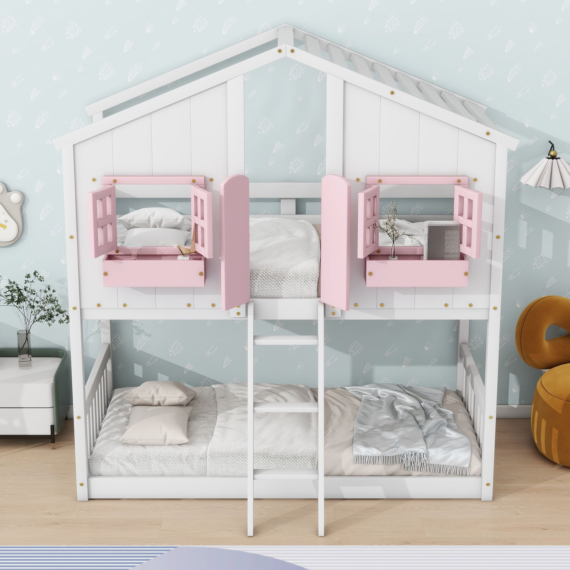 A white House Bunk Bed With Roof, Window, Window Box, Door, Safety Guardrails, and Ladder features pink window frames and ladders in a kids' room with light blue wallpaper and playful décor.