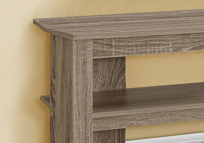 A close-up of the TV Stand, Console, Media Entertainment Center shows its rustic wood finish and two of its three clean-lined storage shelves, positioned against a light yellow wall.