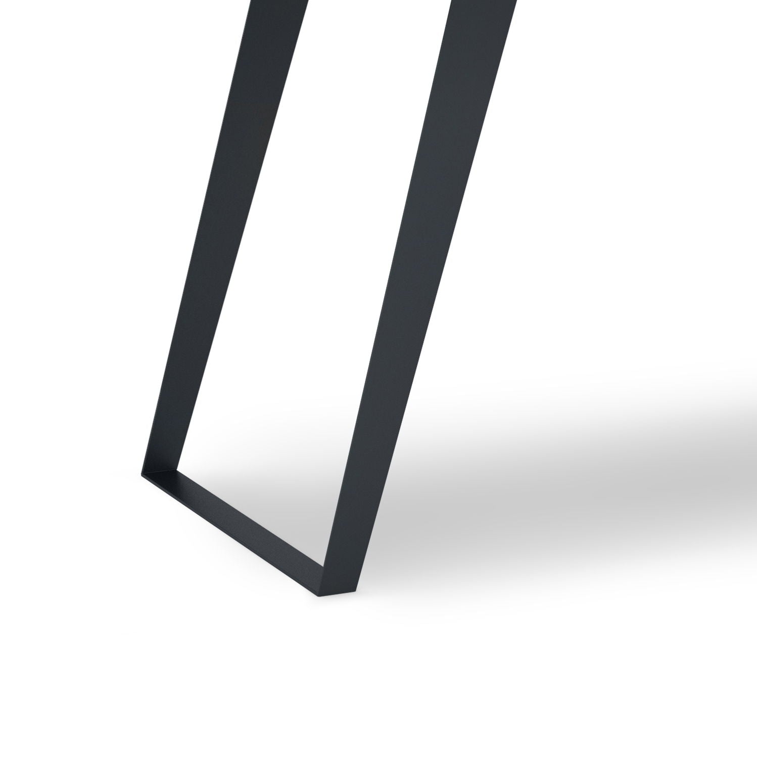 A close-up of the Lowry - Handcrafted Desk’s modern black rectangular metal leg, set against a plain white background with a soft shadow to the right.