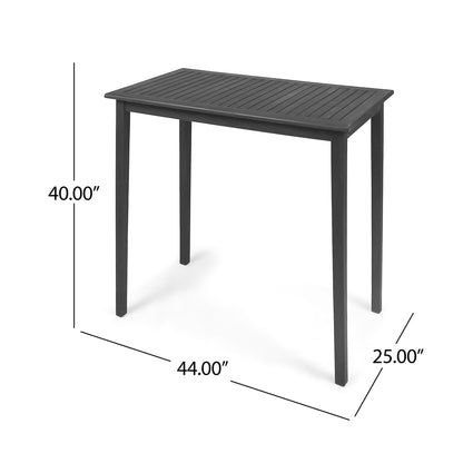 The Outdoor Minimalist Acacia Wood Rectangle Bar Table features a black slatted surface, four straight legs, and measures 40" high, 44" wide, and 25" deep.