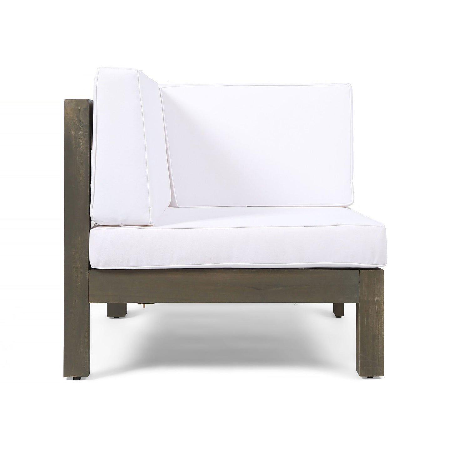 The Oana Arm Chair is a modern outdoor corner chair featuring a wooden frame and thick white seat and back cushions, displayed against a plain white background.