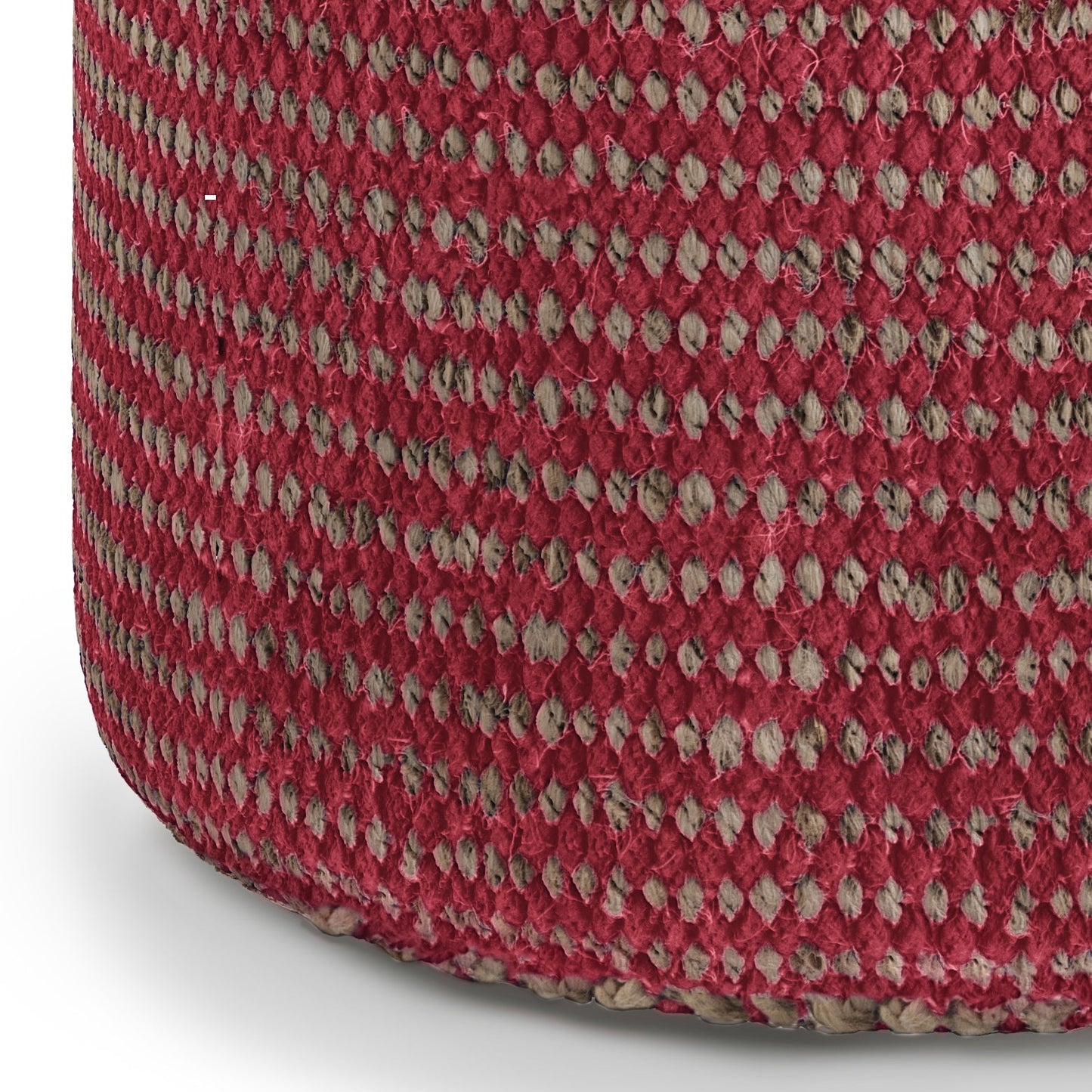 Close-up of the Larissa - Handcrafted Round Braided Pouf, showing its cylindrical shape and textured pattern of alternating red and beige fibers. The gently curved base rests on a light surface.