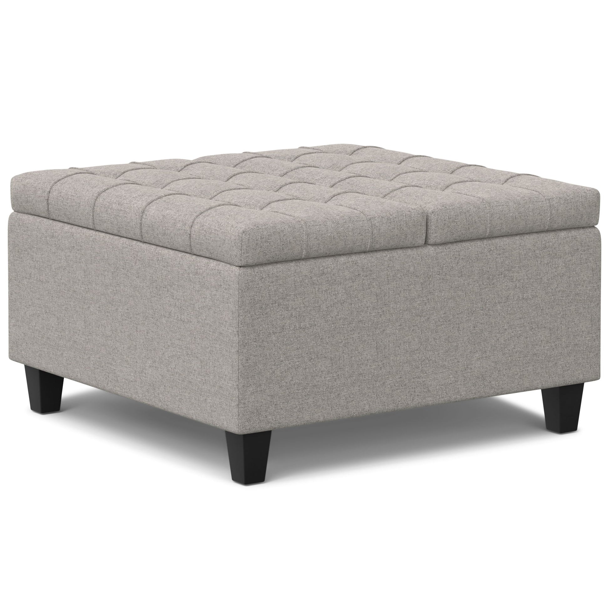 The Harrison - Upholstered Coffee Table Storage Ottoman features a square, light gray design with a tufted top and short black legs, shown against a white background.