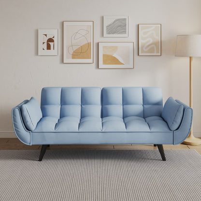 A modern living room featuring the Sofa Soft Two Armrests with throw pillows, a gray rug, floor lamp, and five abstract art pieces in light wood frames on a white wall.