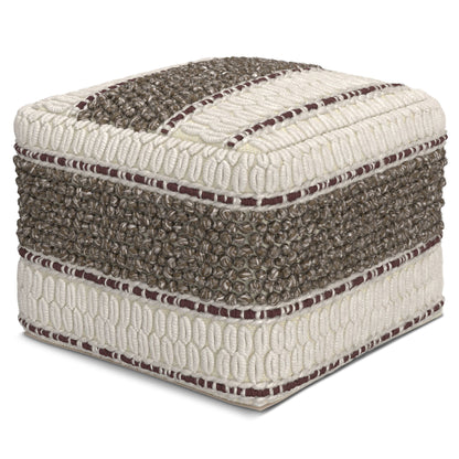 The Grady - Handcrafted Square Pouf features a cozy, textured design with alternating cream and brown horizontal stripes, woven fabric, and detailed looped and knotted patterns for decorative appeal.