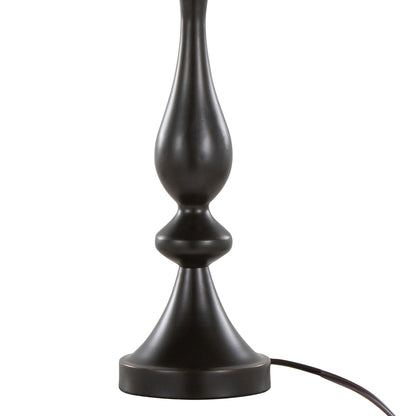 Close-up of the base and lower stem of the Topaz - Contemporary Table Lamp, featuring a curvy, sculpted black design on a white background. A black power cord extends from its base.
