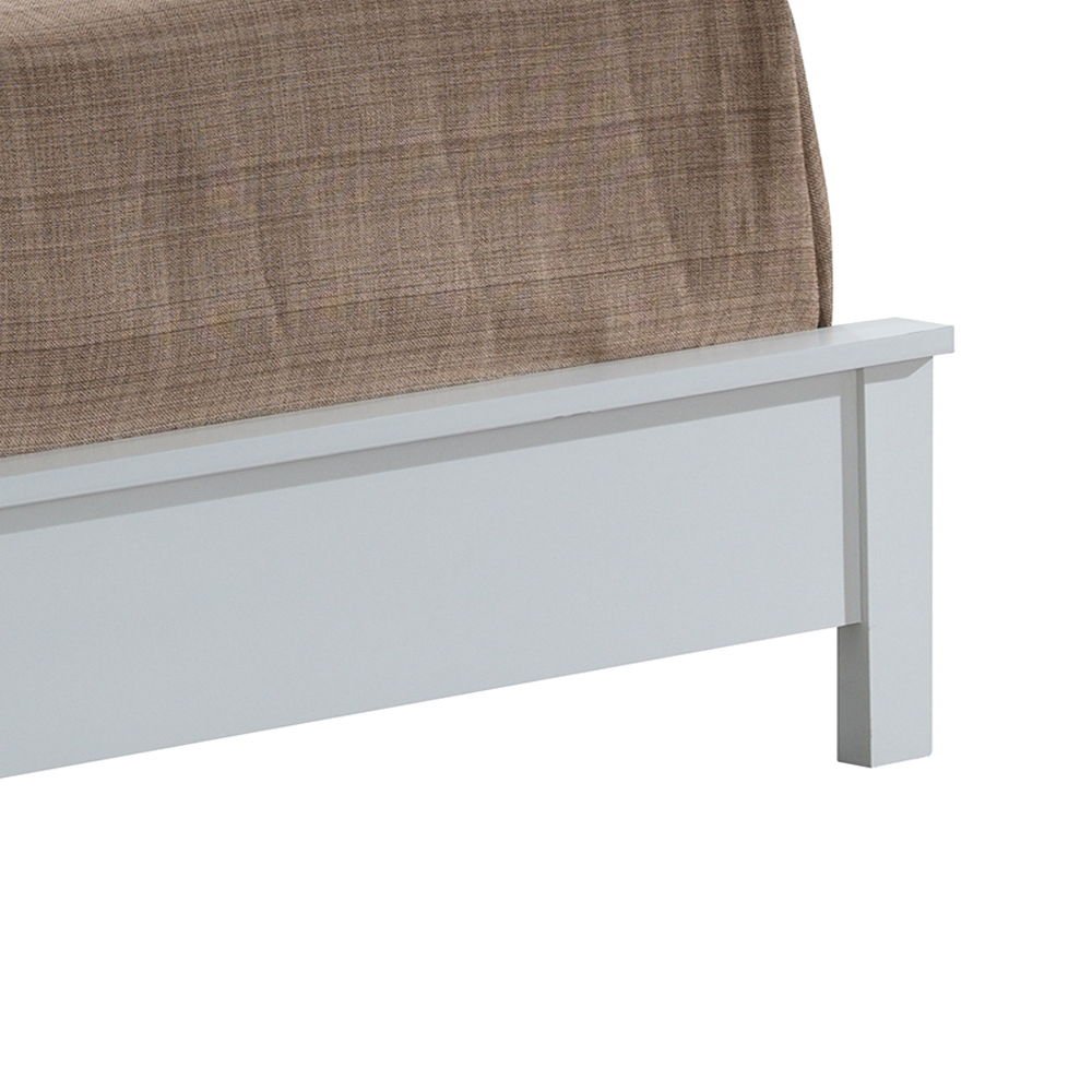The image shows the lower corner of the Bed With Transitional Design Stylish, a white wooden frame with a brown textured blanket draped over the mattress.