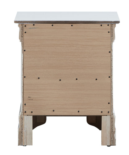 The Lorana Nightstand is shown from the back, featuring an unfinished wood panel secured with visible screws and a contrasting darker finished top.