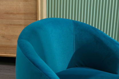 A close-up of the Velvet Fabric Swivel Accent Armchair Barrel Chair With Powder Coating Metal Ring in teal, featuring curved lines, set before a light green, vertically grooved wall and a wooden cabinet.