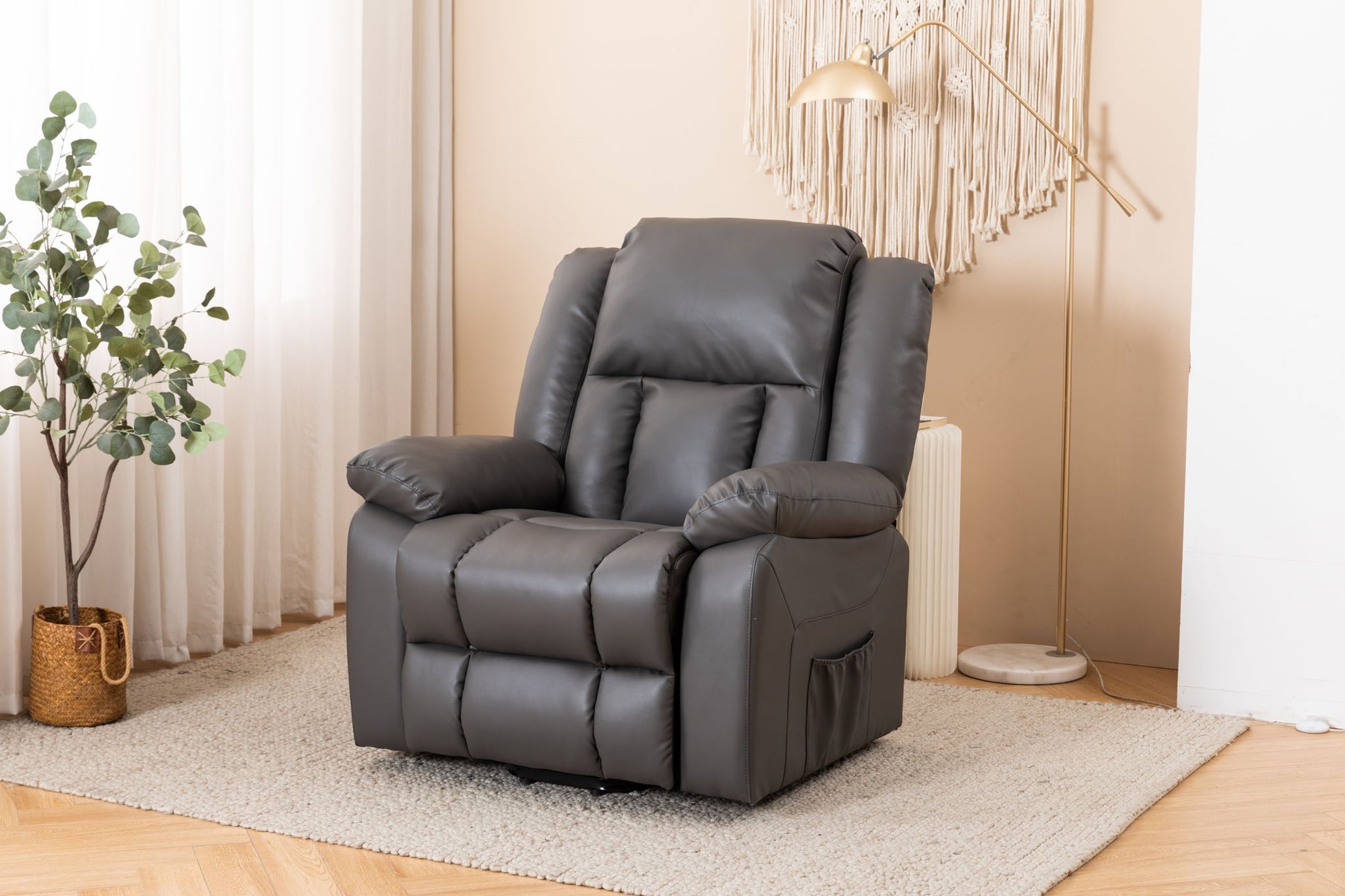 An Electric Power Massage Recliner Chair sits on a light rug in a cozy living room, surrounded by a potted plant, floor lamp, and wall hanging. Neutral tones and soft lighting add to the relaxed atmosphere.