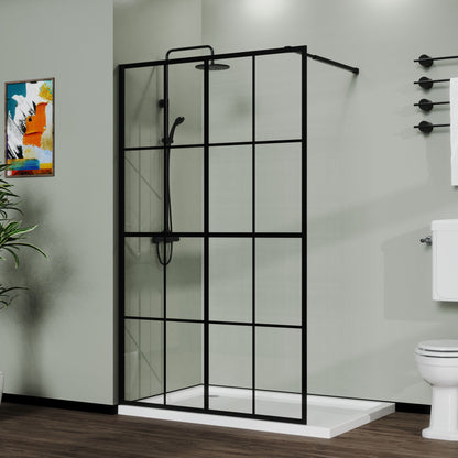 Modern bathroom featuring the Shower Screen Walk In Wet Room - Black, rain shower head, white toilet, towel rack with folded towels, abstract wall art, potted plant, and dark wood floor.