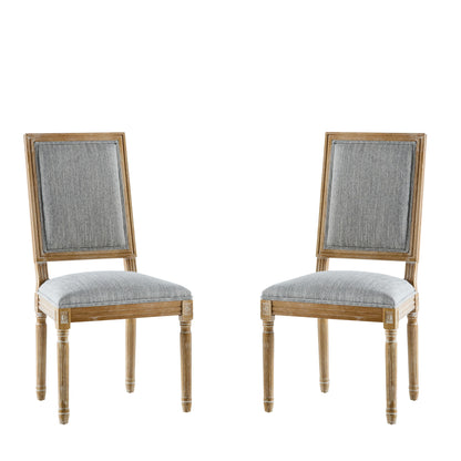 A pair of French Country Style Dining Chairs with light gray upholstered seats and square backs, featuring fluted legs, shown against a white background.