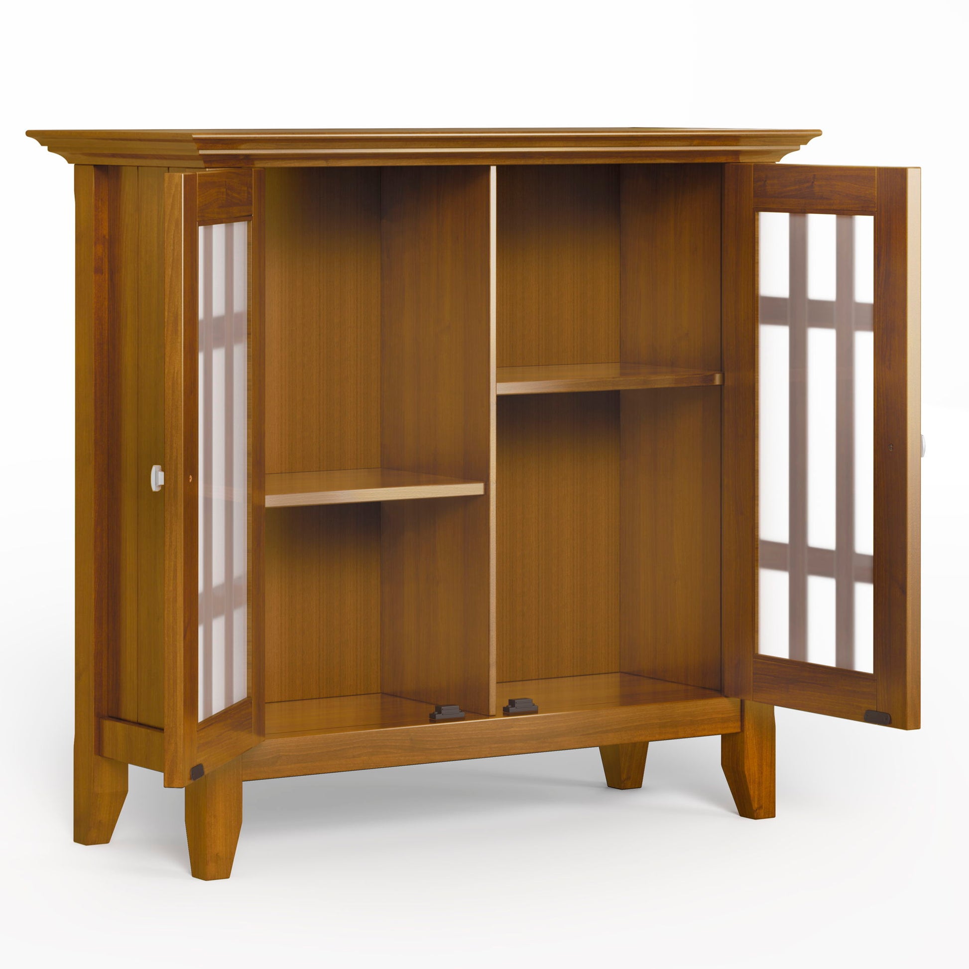 The Bedford - Storage Media Cabinet features glass-paneled doors that open to reveal two shelves and four compartments. With a natural wood finish, straight legs, and a simple modern design, it offers stylish storage for your media items.