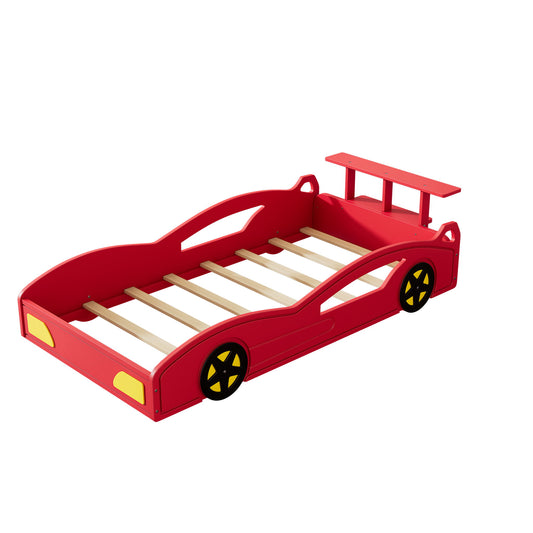 The Wooden Race Car Bed is a red, car-shaped twin platform bed for teens, featuring black wheels, yellow headlights, and a rear spoiler; shown without a mattress on a white background.