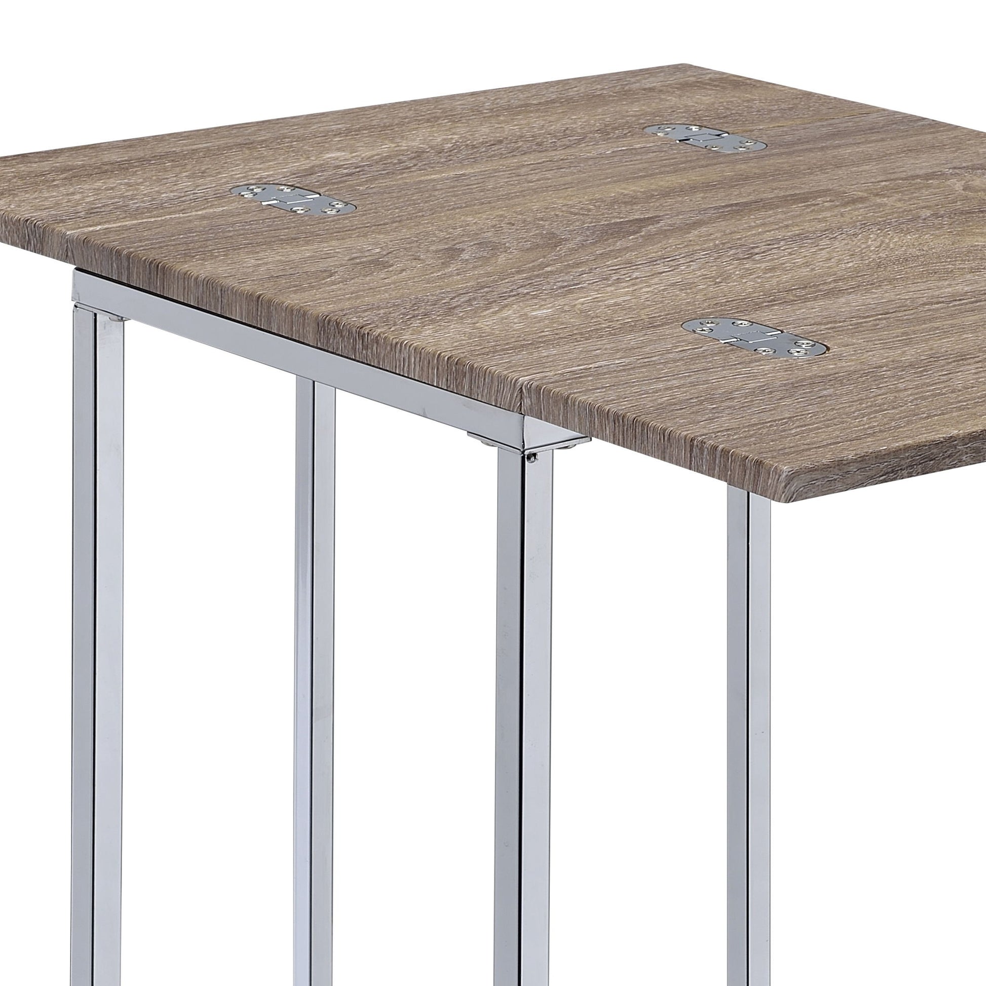 A close-up of the Danson - Weathered Accent Table - Oak shows its wooden top with visible grain and sturdy metal brackets connecting the oak surface to chrome-finished rectangular legs.