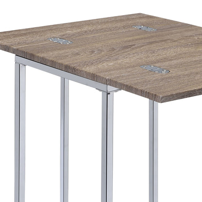 A close-up of the Danson - Weathered Accent Table - Oak shows its wooden top with visible grain and sturdy metal brackets connecting the oak surface to chrome-finished rectangular legs.
