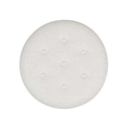 The Yolanda Round Upholstered Accent Ottoman features a white textured surface and seven evenly spaced small circular cutouts in a hexagonal pattern, shown from above against a white background.