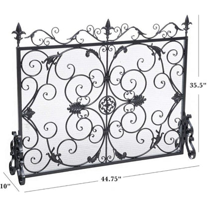 The Darcie Wrought Fireplace Screen features ornate scrollwork and leaf designs with decorative feet. Measures approx. 44.75" W x 35.5" H x 10" D.