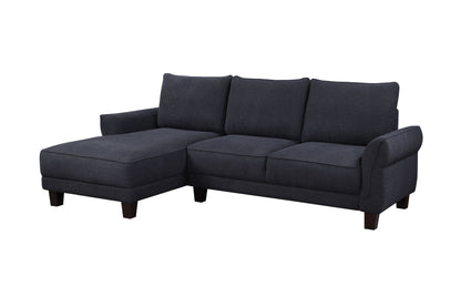 The Belle - Sherpa Sectional Sofa With Left Facing Chaise is a dark gray sectional with three seat and back cushions, a left-side chaise, short wooden legs, and gently curved armrests, shown against a white background.