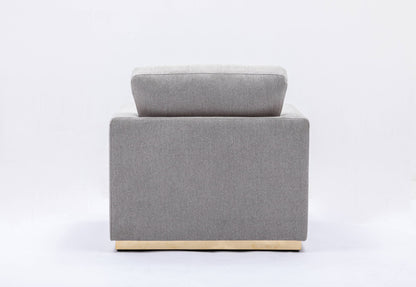 The Couch.com Valin Linen Chair in gray features a modern style, fabric construction, and a gray finish, shown from the back with a rectangular shape and light wood base against a plain white background.